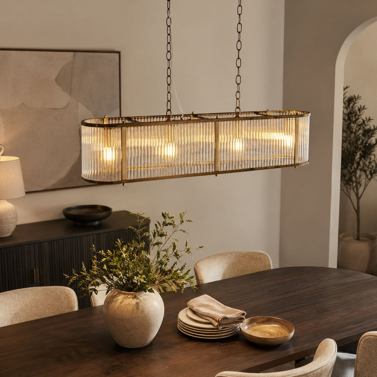 Room visualisation featuring Halo 4-Light Antique Brass Linear Glass Pendant