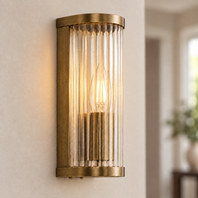 Halo Antique Brass Ribbed Glass Wall Light, illuminated